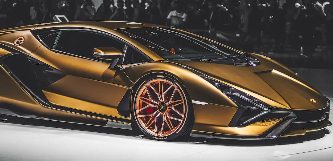 gold Lamborghini up close at the Geneva motorshow 